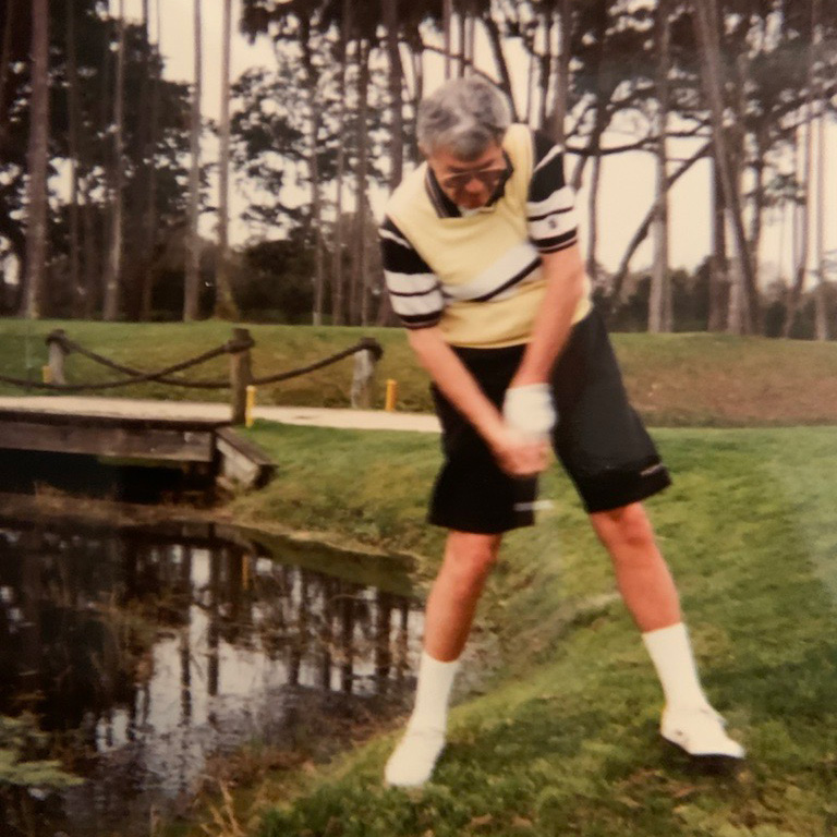 Byron golfing